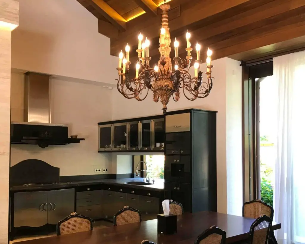 Chandelier over kitchen table