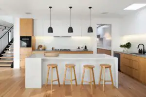 Modern kitchen with several lighting types and fixtures