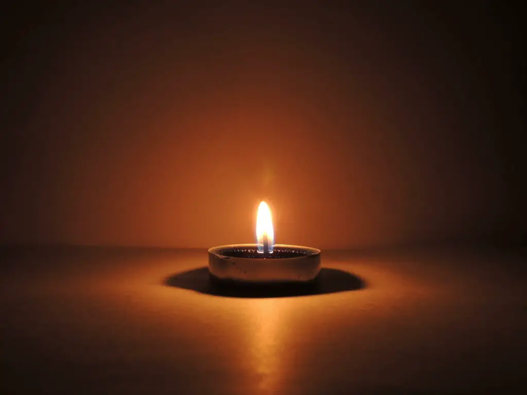 small candle with light